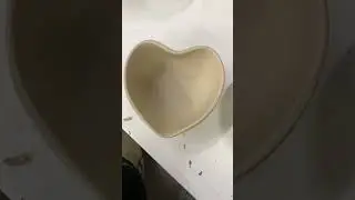 trimming a heart bowl! #pottery #ceramics #shorts