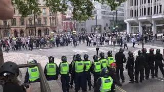 Tensions flare between police and protesters in London | AFP