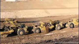 CAT 657B scrapers triple push-pulling