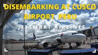 Disembarking A JetSmart Plane At Cusco Airport Peru
