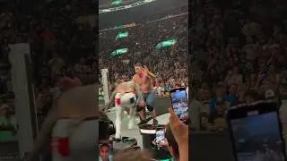 jay uso gives john cena a wonderful spear in a table at #moneyinthebank
