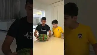Jason and Alex open a watermelon