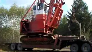 UNLOADING HUGE MADILL 044 GRAPPLE YARDER, JUSKATLA, BC