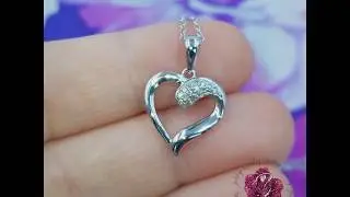 Ebay listing: 0.15ct Diamond Heart Pendant on 18