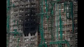 Hong Kong Firefighters Make Final Search for Survivors After Apartment Tower Blaze Kills 128