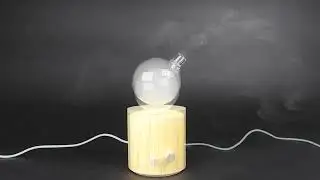 Wood base atomizing diffuser