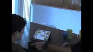 Timmy  Kogen eating at home with Touch chat talking Program
