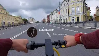 Electric Scooter Ninebot Max G30P, driving through the main street