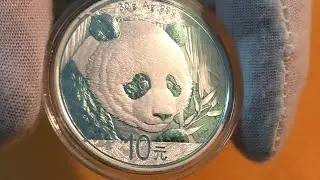 Серебряные 10 юаней 2018