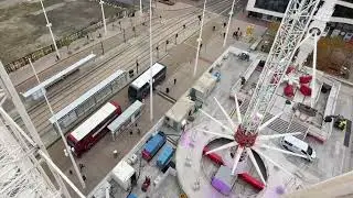 Westside BID videographer Graham Young takes the first rides on the Big Wheel and Star Flyer