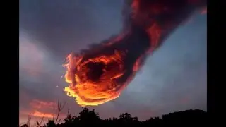 ESPECTACULAR NUBE CON FORMA DE PU&Ntilde;O EN LLAMAS