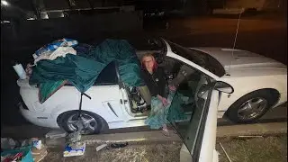 Living in A car outside a homeless shelter