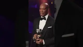 Byron Scott accepts the Community Impact award at the Unforgettable Gala