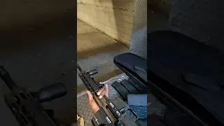 Diamondback AR 15 firing rounds down range after laser bore sighting..
