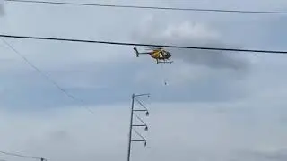 COLOCANDO CABO NO POSTE EUA