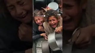Children risk being crushed whlie lining up at charity kitchen in Gaza