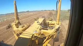 Grading flood levy bank.175