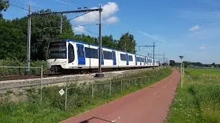 RET Metro 2*Type RSG3 raast voorbij nabij de N209 (station Rodenrijs) richting Den Haag Centraal