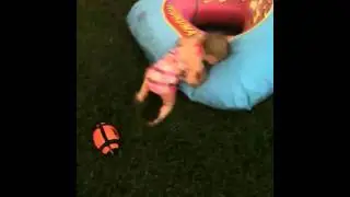 Leigha playing at the lake in the tube