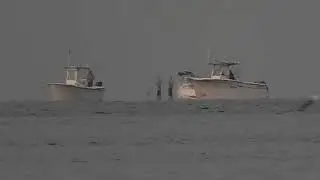 Boat coming in from the vanishing point