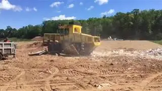 BOMAG Loader landfill compactor at work at the landfill Construction Equipment Powerfull Machines