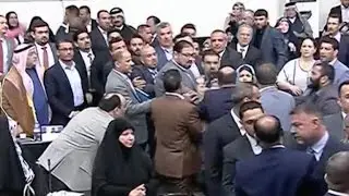 Watch: Iraqi politicians fight in parliament session