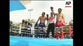Two senior senators participate in kick boxing event to promote Thai culture