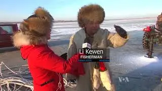 Annual Winter Fishing Festival Under a Frozen Lake in China