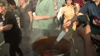 People line up to burn masks at south side bar