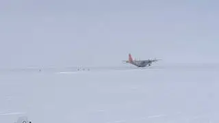 LC-130 Landing At Summit Station, Greenland in the fog