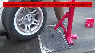 Changing a Port-A-Wall equipped tire with manual tire tools