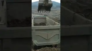 Massive Excavator HYUNDAI HX330 Loading clay on Iveco Dumper