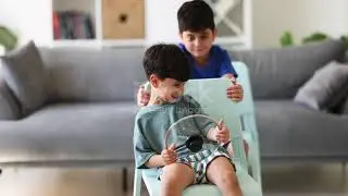Brothers play in the chair car drive 4K stock video 4-5 Years, 4K Resolution, 6-7 Years, Apartment,