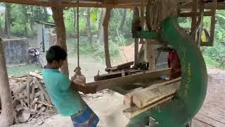 Wood is processed at a wooden architectural factory 