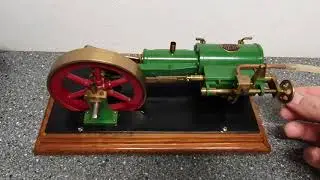 Steam engine with sleeve piston valve reversing gear