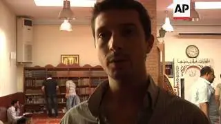 Syrian refugees in Greece gather for Ramadan prayers