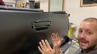 Vinyl wrapping a tailgate handle