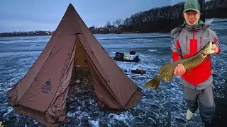 CATCHING GIANT PIKE Through the Ice While Hot Tent Camping!!! (World Record???)