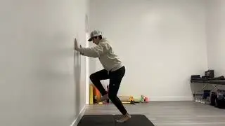 Wall Assisted Skater Squat with Isometric Heel Lift to Triple Extension