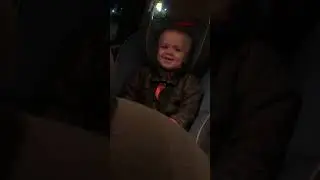 Sleepy toddler tries so hard to stay awake in the drive thru for ice cream.