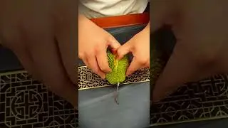 A simple way to peel a mini durian that has just been picked in the garden #shorts