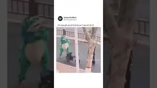 Man dressed as a police frog laughing