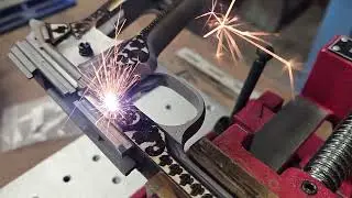 Colt 1911 government stainless frame laser engraving scroll and leaf pattern. DAY 4