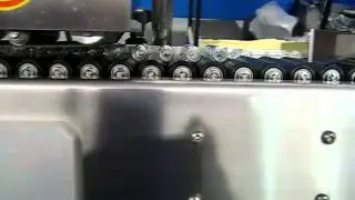 CVC 350B Labeler, Labeling cylindrical containers, wrap around label application