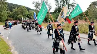 Lonach Highlanders march out through Strathdon in Cairngorms for 2025 Lonach Gathering in Scotland