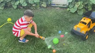 Yusuf su balonlarını tazyikli suyla patlatmaya çalıştı ama olmadı😂 en son ayağıyla patlattı😬