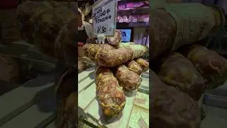 Italian Salami Sausages and Hanging Cheese. Italy Street Food Market