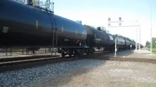 A 4-pack of CP, ICE, & DME SD40-2 EMD's hit the diamond with CP Ethanol