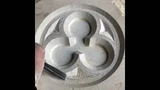 Working the dead eyes of the trefoil panel in Lincoln Cathedral limestone