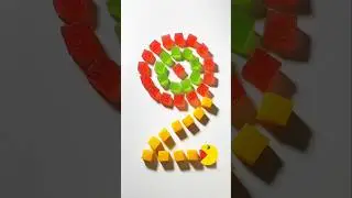 #Greedy #Pacman spiral feast Pacman chomps yellow jelly cubes while eyeing a colorful red & green